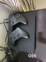 Xbox one x 1TB with two controllers