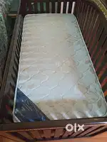 Wooden Baby cot with mattress with child friendly polish