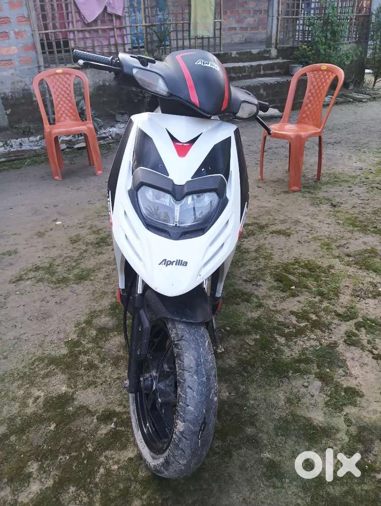 Aprilia (SR 150) in black and white colour