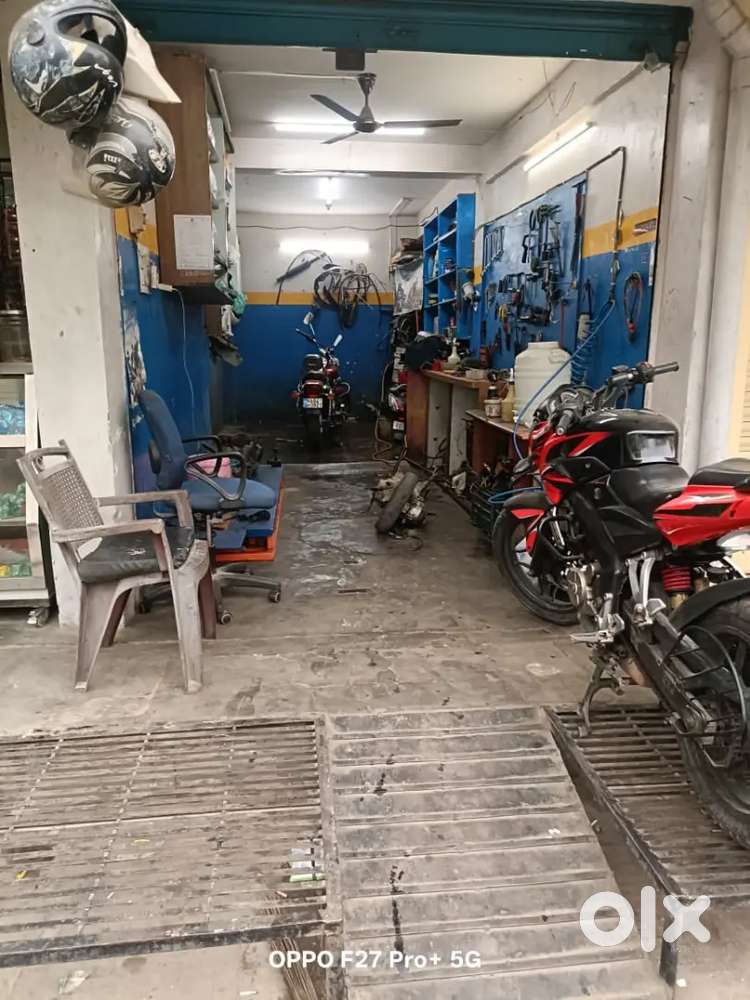 Running Two wheeler garage and washing centre with complete setup