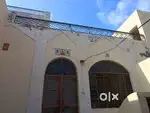 A one location behind pink model school