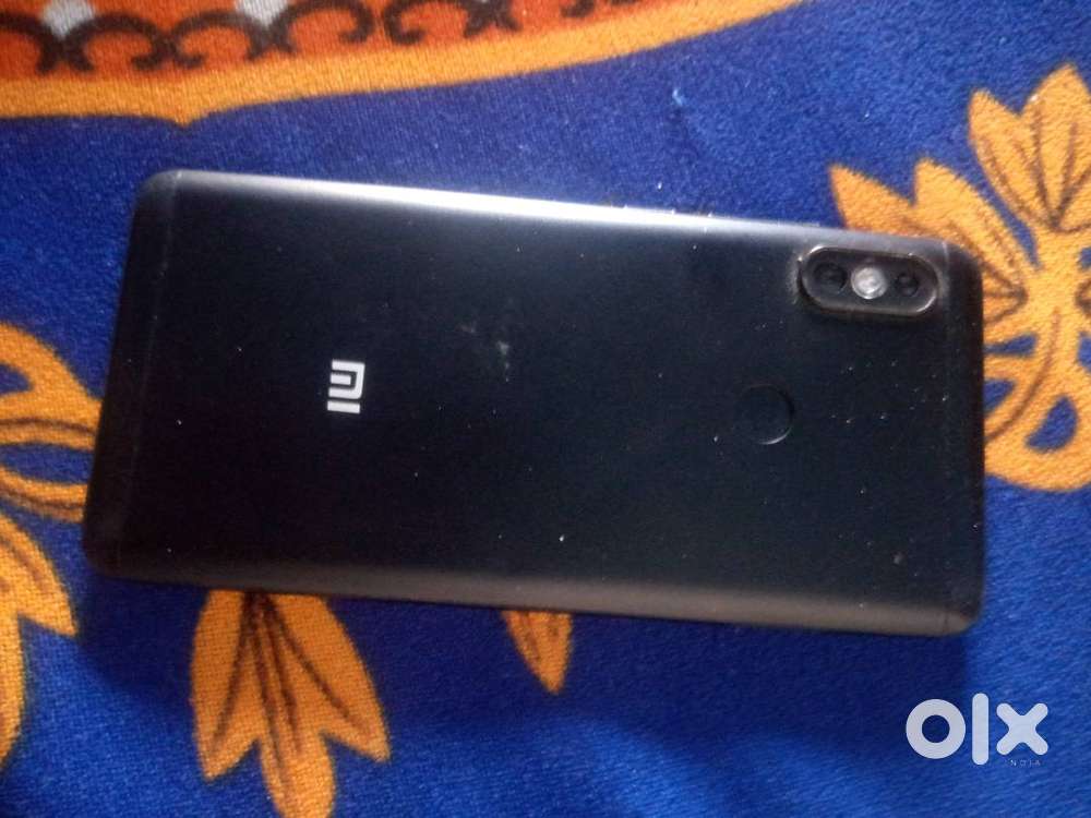 Crack display and one dent on back panel and no betray