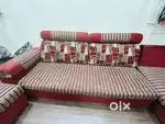 L shape sofa set with one puffy