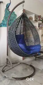 Hanging chair with stand and seat pillow