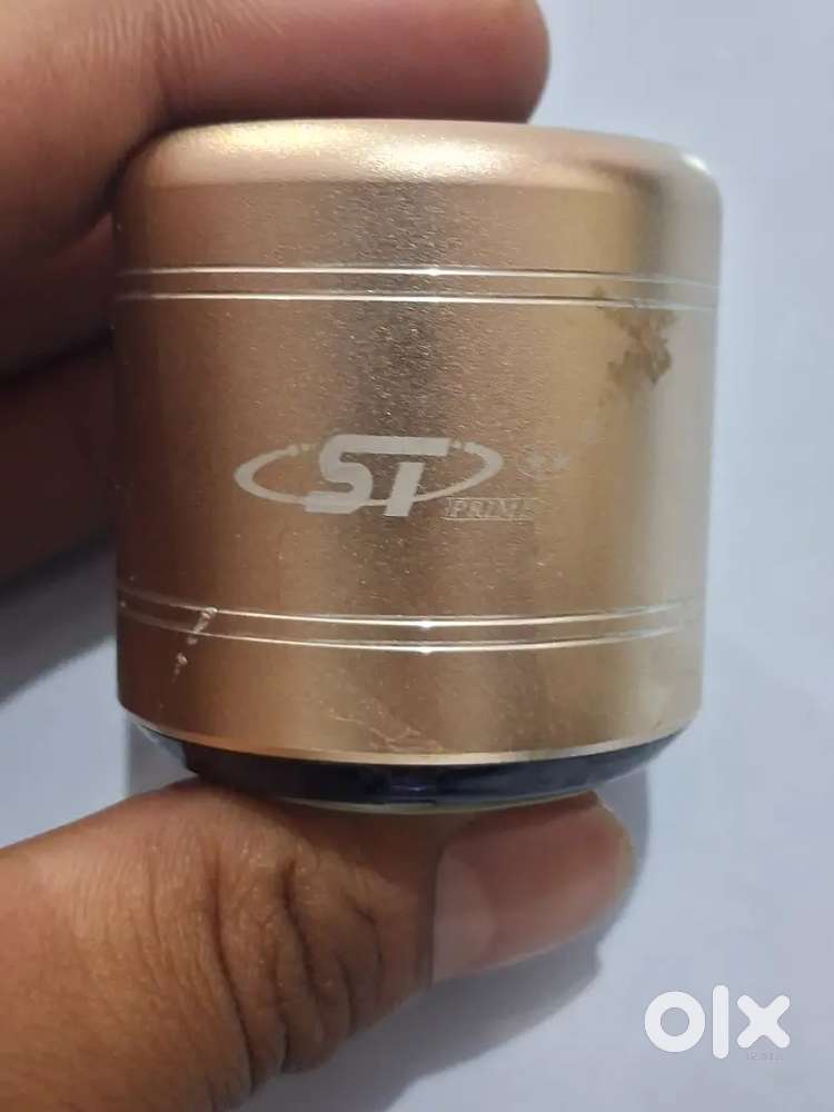 The product in the image is an M3 Mini Portable Bluetooth Speaker.