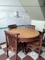 Wanna dining table set up with four chairs and big 6 chairs