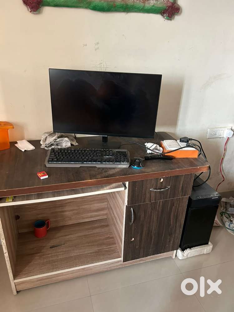Water cooler, computer desk and chair