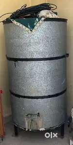 Grain storage drum with stand