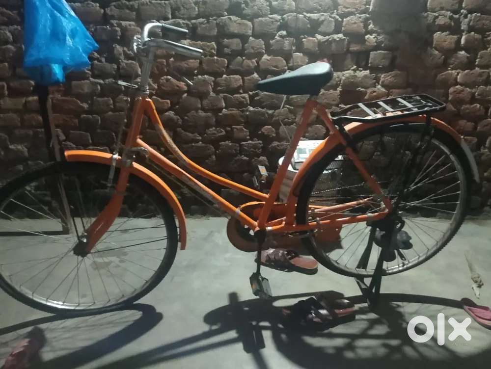 Girls Cycle.Orange Colour (Good Condition)