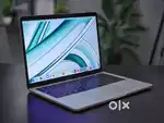 MacGallery Macbook Pro Touchbar 13 inch Silver next to new Condition.