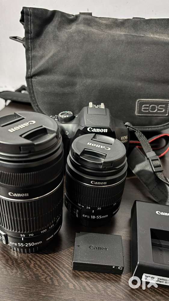 Canon 1300D with lenses .