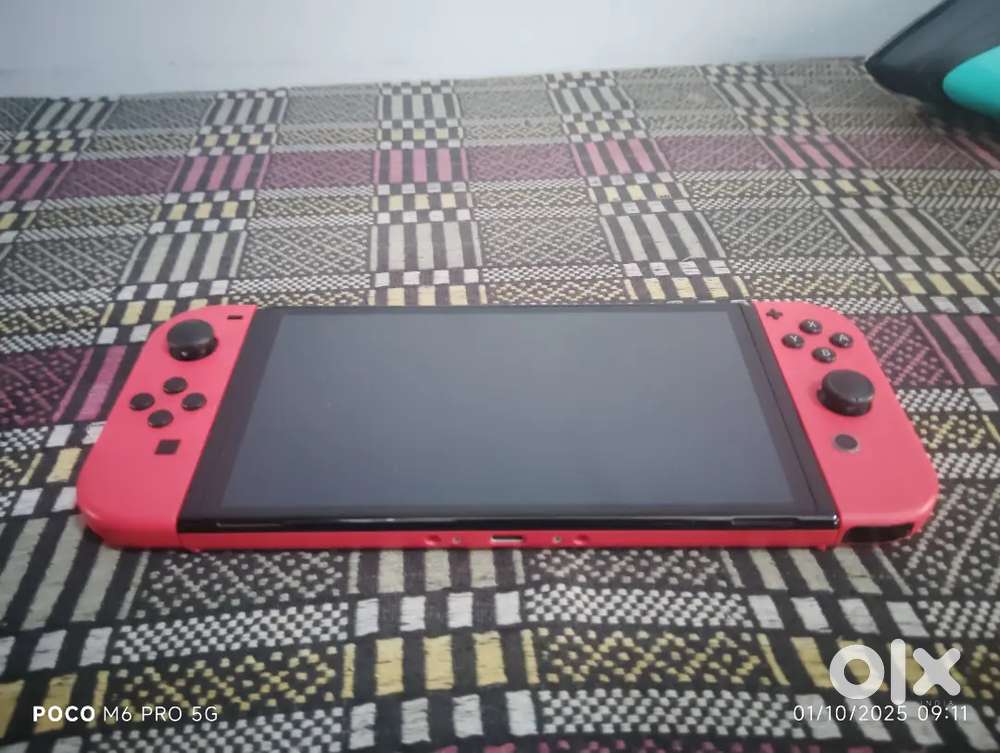 Nintendo Switch Oled - Mario Red 64 GB
