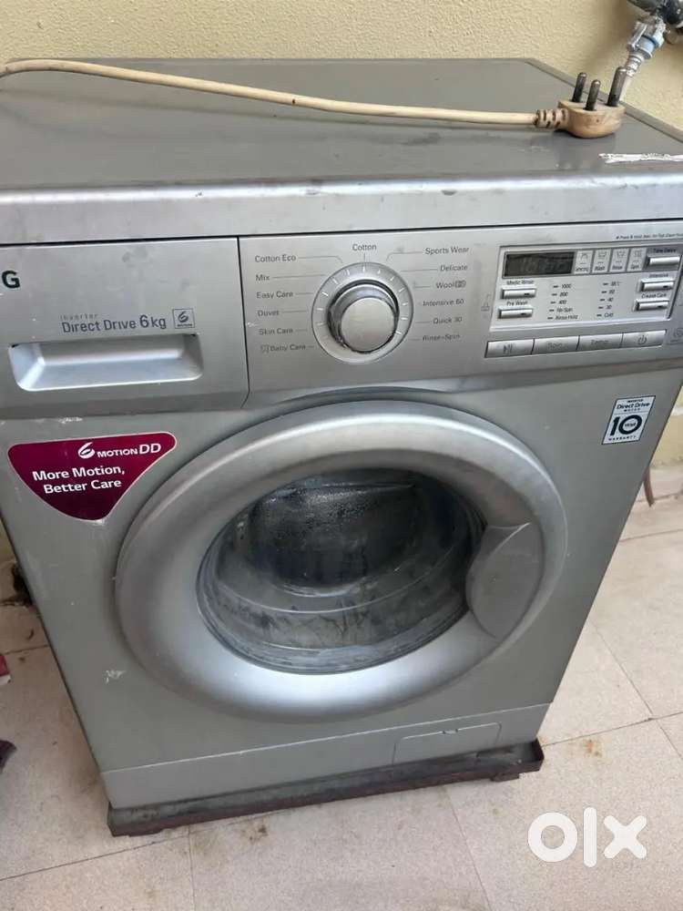 LG FRONT LOAD WASHING MACHINE 6 KG