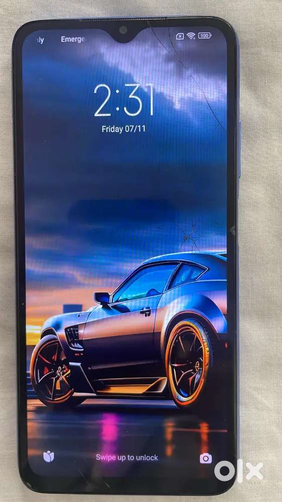 Original screen slightly crack but every works fine.