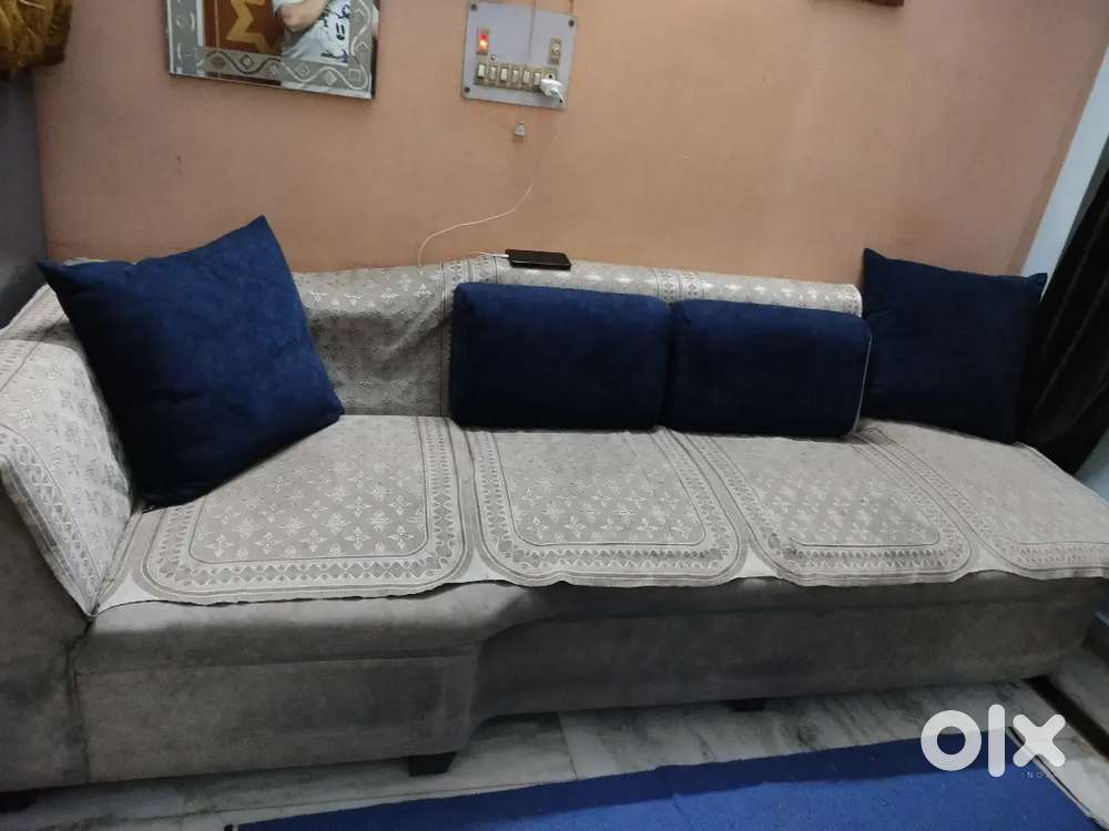 Sell Big sofa 4 sitter and heavy centre table.