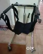 Bed patient lifting machine