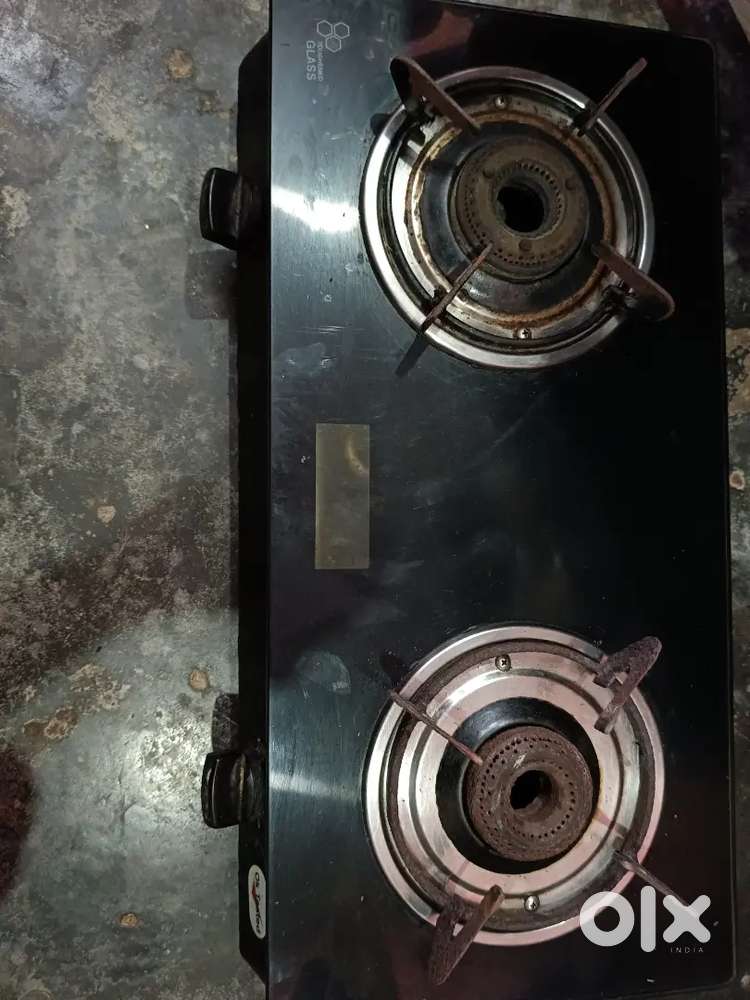 Gas stove, Hawkins pressure cooker and a kadai