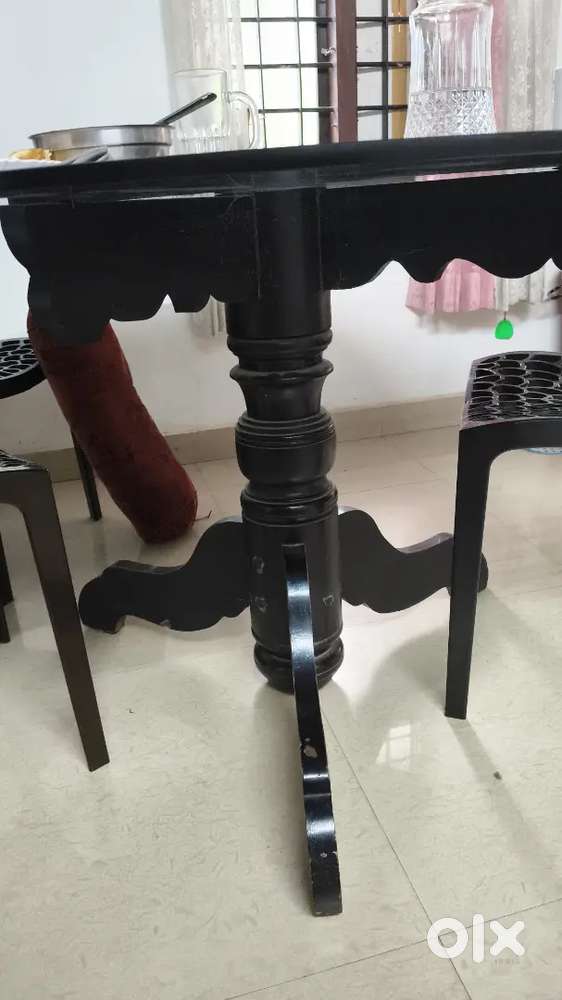 Glass top dining table