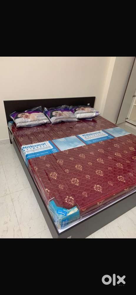 2 nos New Cots along with Matresses ( No pillows)