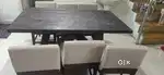 Sofa and wooden dining table.