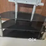 Up to 50 inch TV glass stand 3 years old.