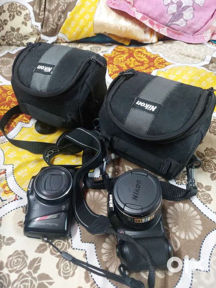Canon SX150IS 14.1mp And Nikon Coolpix L330 20.2mp