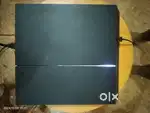 PlayStation 4 with 10 games and two controllers