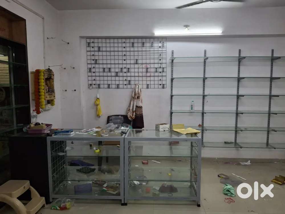 Stell racks and table with all glass material on sale