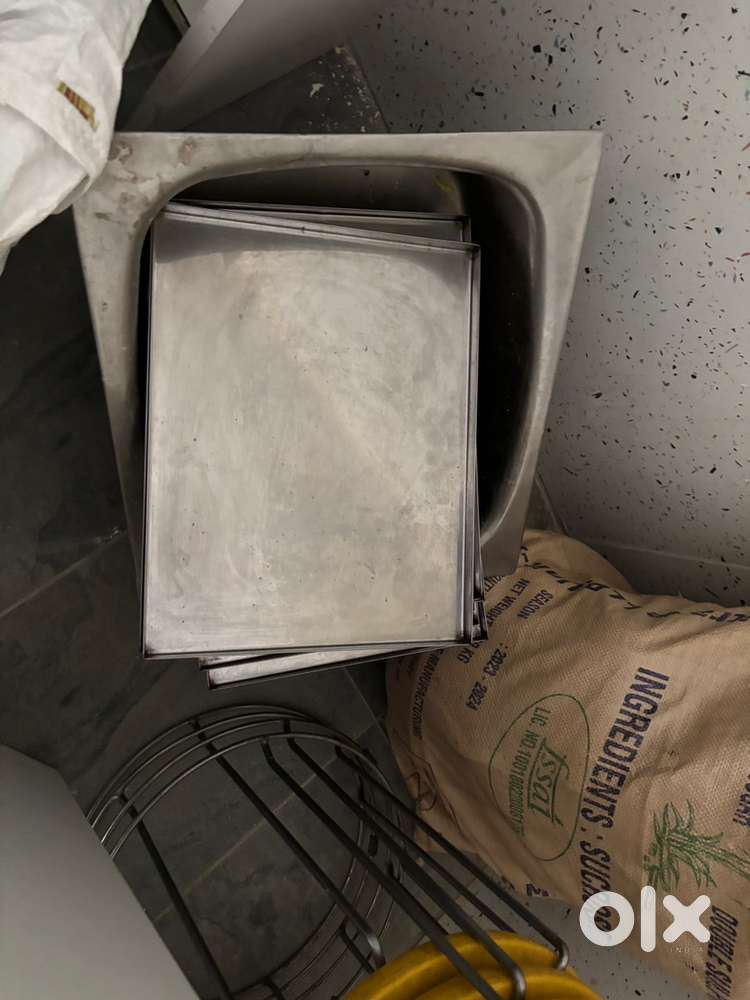 bakery table with rackes, sink