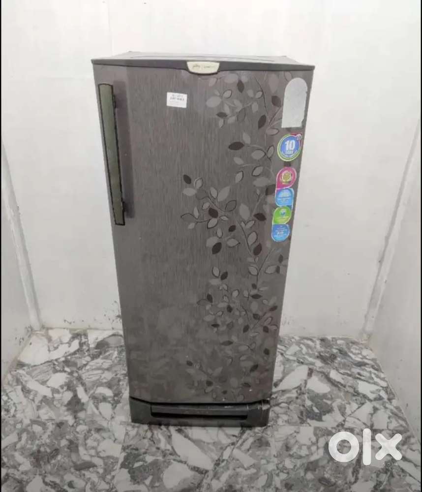 Single door grey colour axis model refridgerator with built in stand