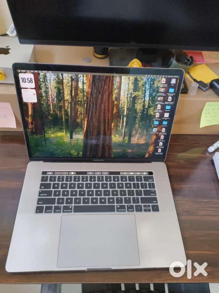 Macbook Pro.   With original charger and cover