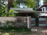 Around 12cents land and 2 BHK Semi- furnished house facing east.