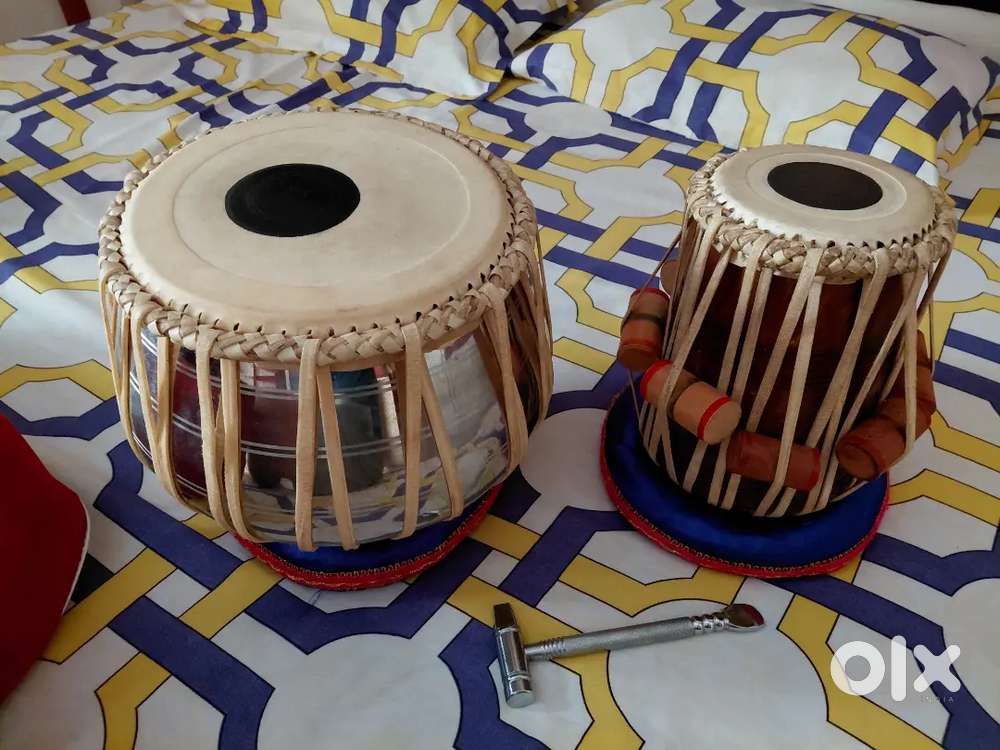 Tabla with bag and hammer