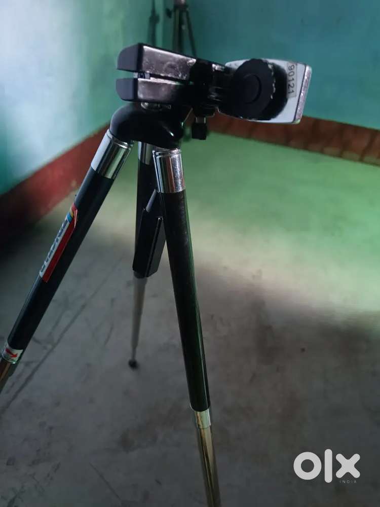 Tripod with cover