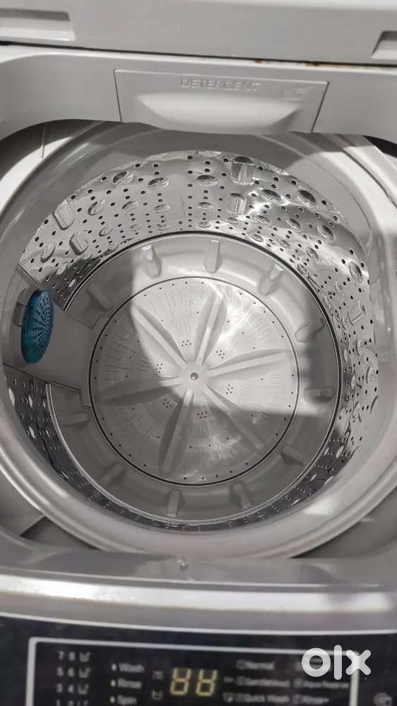 Lg 7 kg fully automatic washing machine top load.