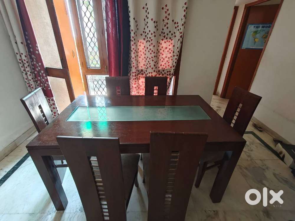 Teak wood six seater dining table 10 years old