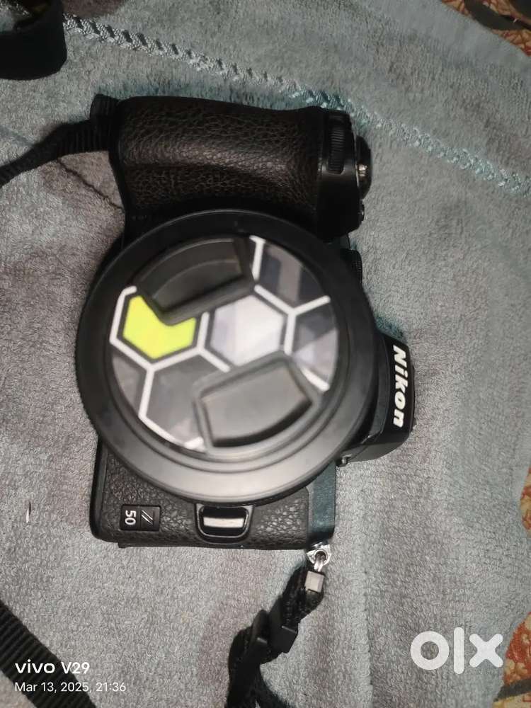 Nikon z50 camera Sutter count 18k someting and 50 mm lens just 1 week