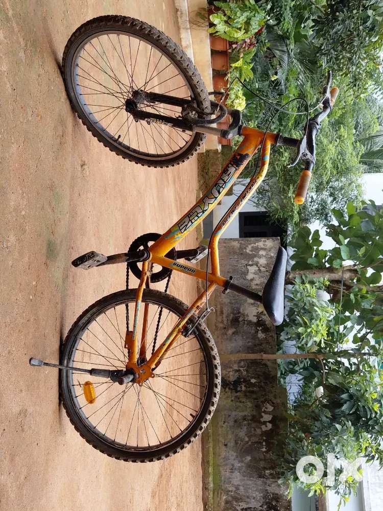 this is orange yellow coloured good condition bicycle