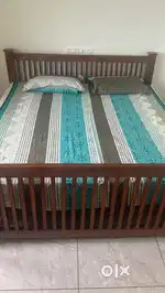 Wooden cot and mattress