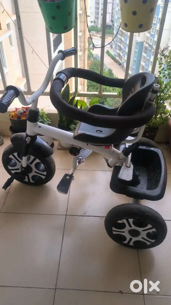 Baby Tricycle in good condition with storage