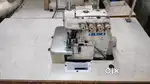 Overock and folding machine