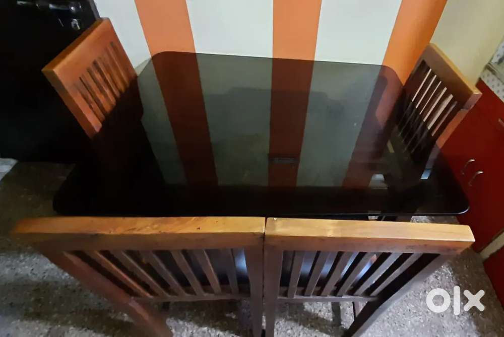 Heavy glass dining table