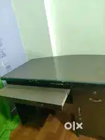 Standard Wooden/ Engineered wood table with drawers.