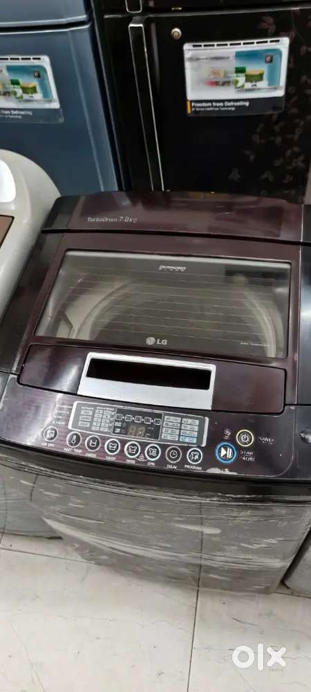 LG washing machine fully automatic top load with warranty 1 year old