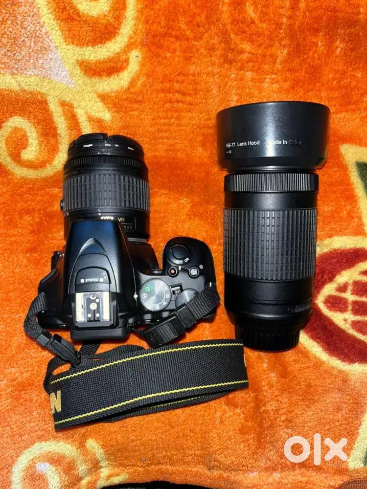 It is a screen touch camera with 18-55 and 70-300 mm lens.Argent money