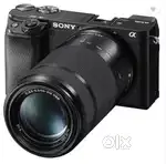 Sony a6100 with 16-55mm lens + 55-210mm lens