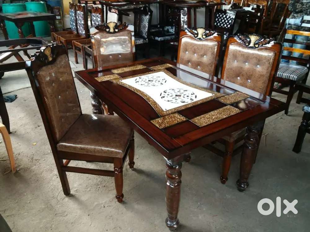 4 seater dining table with glass only available at STARF FURNITURE