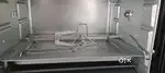 Electric oven with grill and rotisseri