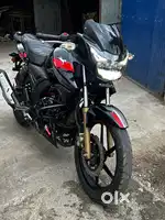 Red and black colour Apache RTR 180