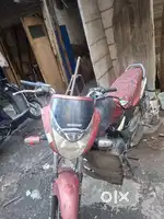 Red colour unicorn Honda 2011 ka model hai 29000 km chali huwi bike i